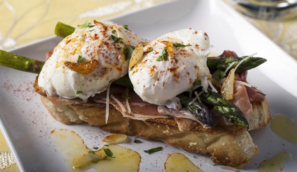 Photo of Poached Eggs with Serrano Ham and Garlic Asparagus